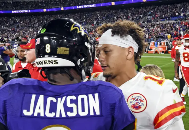 Kansas City Chiefs quarterback Patrick Mahomes (15) and Baltimore Ravens quarterback Lamar Jackson (8)