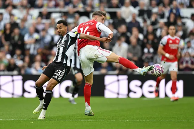 Viktor Gyoekeres of Arsenal is challenged by Jacob Murphy