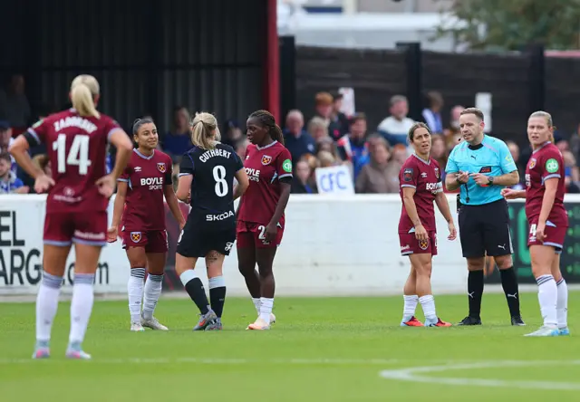 Ines Belloumou of West Ham United reacts as she is shown a red card during the Barclays Women's Super League match between West Ham United and Chelsea FC at Chigwell Construction Stadium on September 28, 2025 in Dagenham, England.