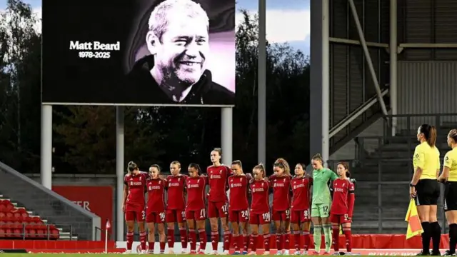 Liverpool players line up for a minute's silence to remember Matt Beard