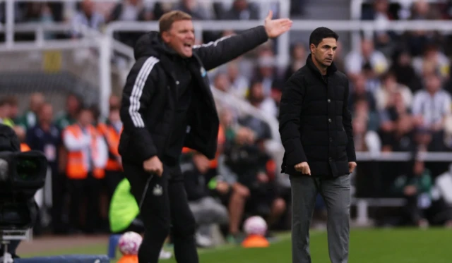 Newcastle United manager Eddie Howe reacts as Arsenal manager Mikel Arteta looks on
