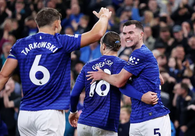 Michael Keane of Everton celebrates scoring his team's first goal with Jack Grealish and James Tarkowski during the Premier League match between Everton and West Ham United at Hill Dickinson Stadium on September 29, 2025 in Liverpool, England.