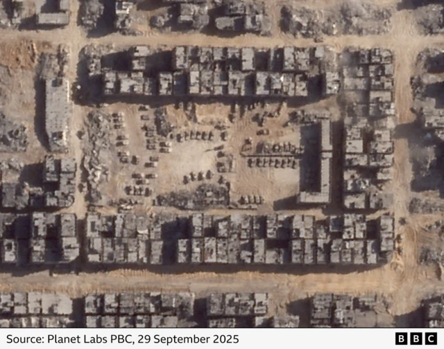A satellite image showing at least 70 armoured vehicles next to buildings that formerly made up al-Mawhobeen School in Sheikh Radwan