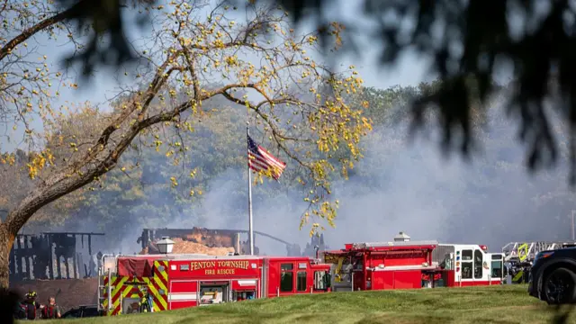 Emergency services respond to a shooting and fire at the Church of Jesus Christ of Latter-day Saints on September 28, 2025 in Grand Blanc, Michigan
