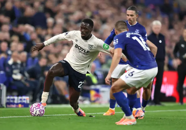 West Ham United's Soungoutou Magassa in action with Everton's Vitaliy Mykolenko and Jack Grealish