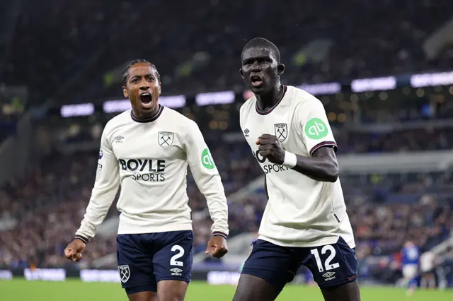 Kyle Walker-Peters and El Hadji Malick Diouf of West Ham United celebrate their side's first goal scored by Jarrod Bowen of West Ham United (not pictured) during the Premier League match between Everton and West Ham United at Hill Dickinson Stadium on September 29, 2025 in Liverpool, England.