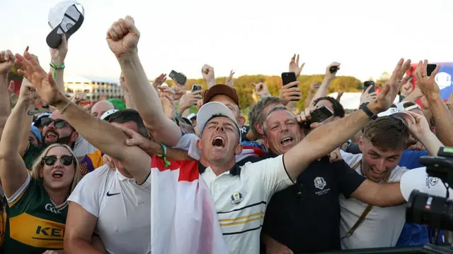 Rory McIlroy celebrating with European fans