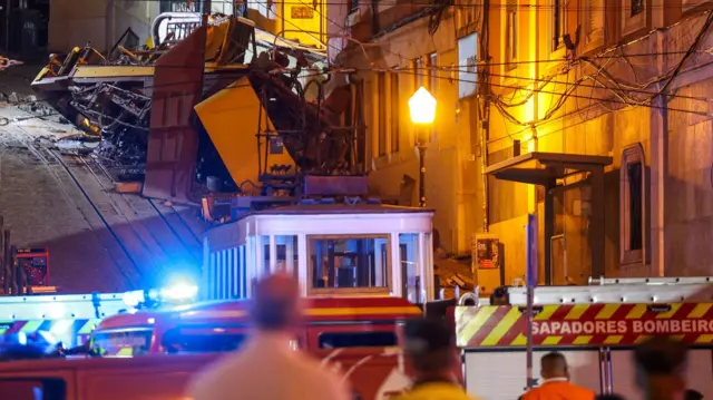 The damage at the scene after the Gloria funicular cable railway derailed in Lisbon,