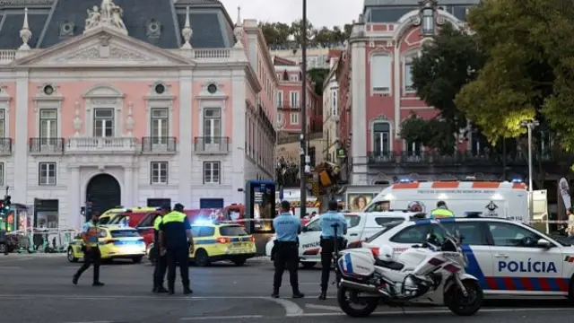 Pink buildings and multiple police cars