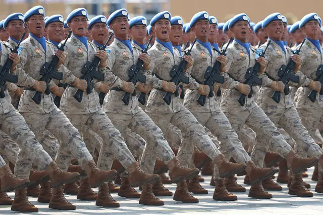 Soldiers march during a military parade