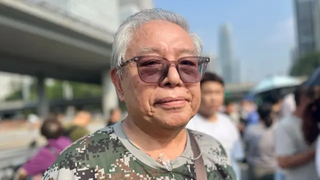 Mr Han looking at the camera