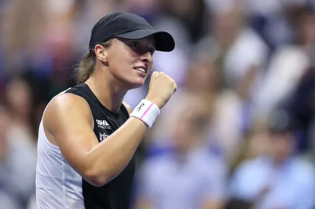 Iga Swiatek celebrates victory at US Open in New York with a fist pump