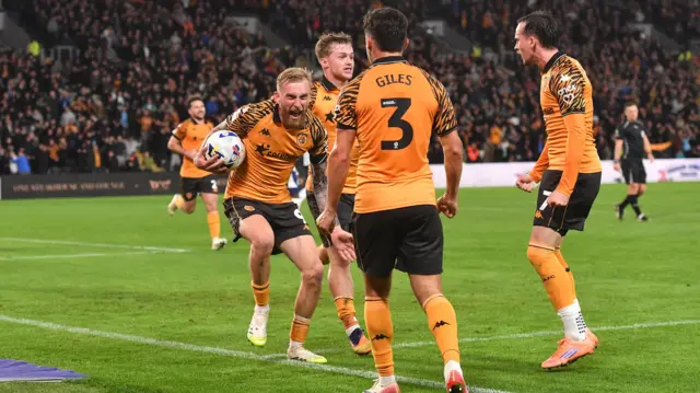 Oli McBurnie celebrates with team-mates