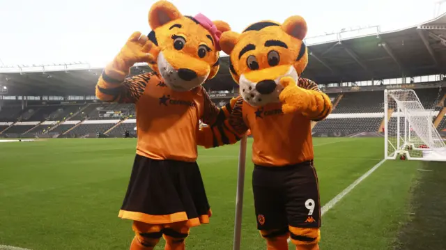 Hull City mascots pose for the camera at the MKM Stadium