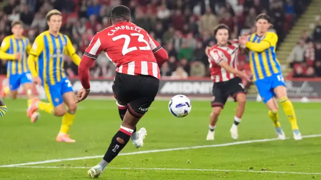 Tyrese Campbell scores from a narrow angle