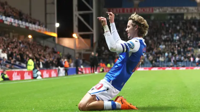 Todd Cantwell slides on his knees after scoring for Blackburn
