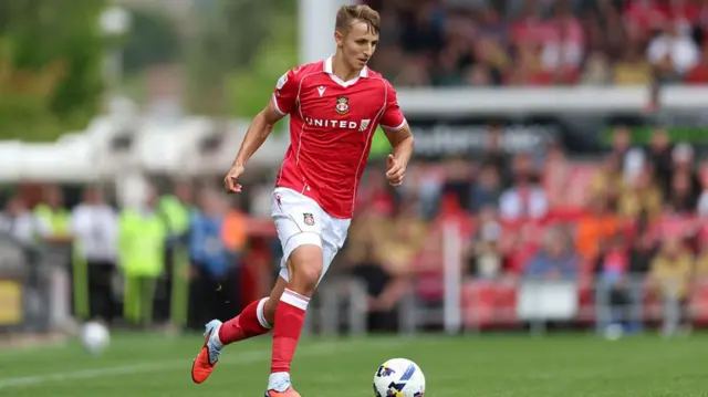 Defender Max Cleworth has risen the leagues with Wrexham
