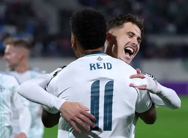 Jamie Reid celebrates