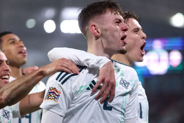 Conor Bradley celebrates