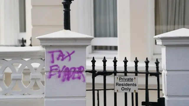 Graffiti daubed outside the apartment building in Hove, East Sussex, where Deputy Prime Minister Angela Rayner owns a second home.