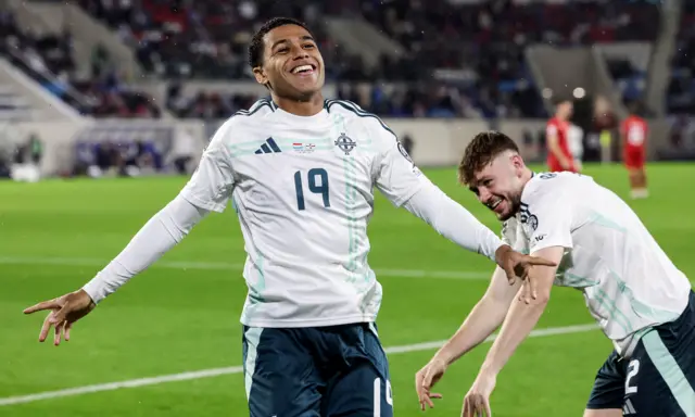 Shea Charles celebrates