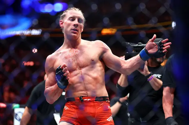 Paddy Pimblett celebrating in the UFC cage