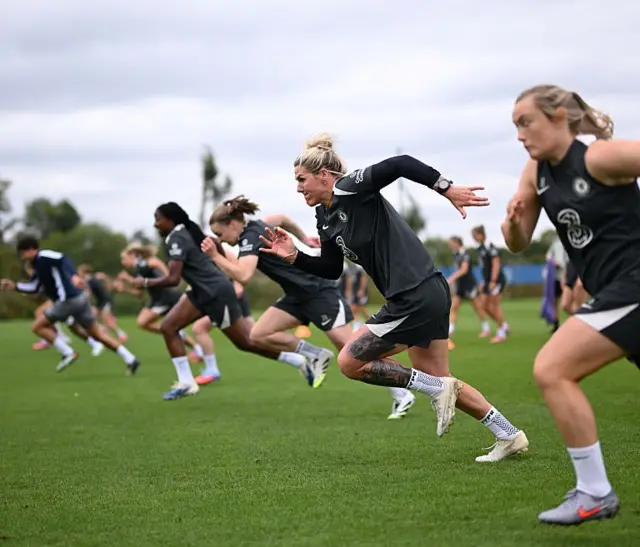 Chelsea players do a running drill in training
