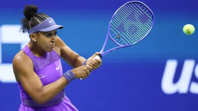 Naomi Osaka hits a backhand