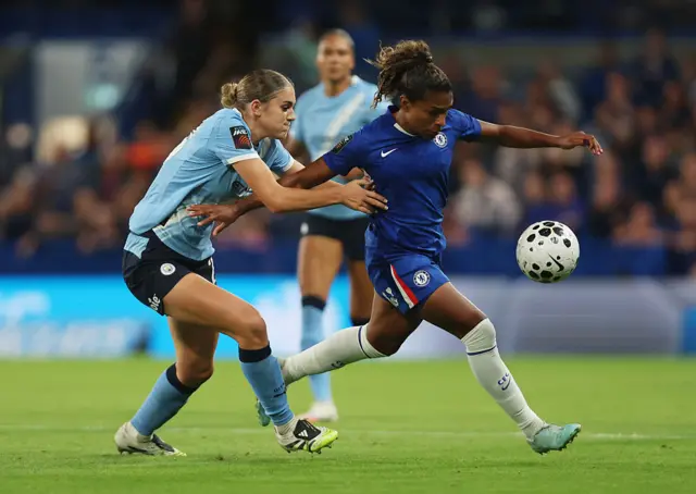 Catarina Macario of Chelsea is challenged by Gracie Prior of Manchester City during the Barclays Women's Super League match between Chelsea FC and Manchester City at Stamford Bridge on September 05, 2025 in London, England.