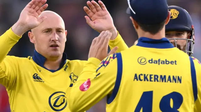 Durham celebrate taking wicket