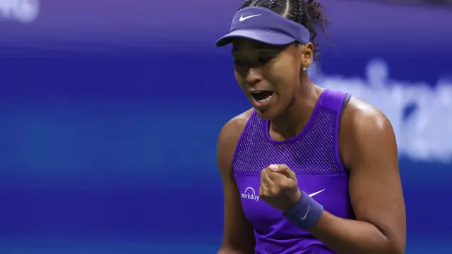Naomi Osaka celebrates