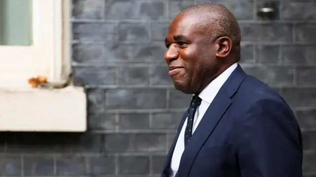 David Lammy walks through Downing Street