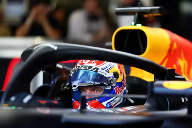 Max Verstappen sat in his Red Bull