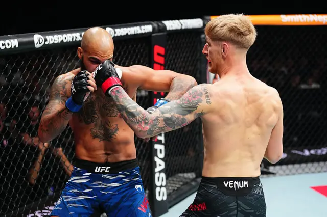 Sam Patterson punching at UFC Paris