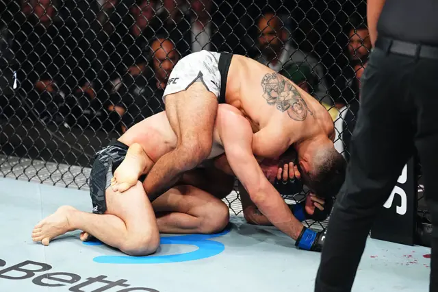 Benoit Saint-Denis submits Mauricio Ruffy with a choke