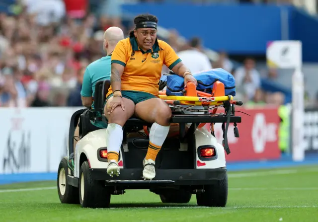 Lydia Kavoa being stretchered off