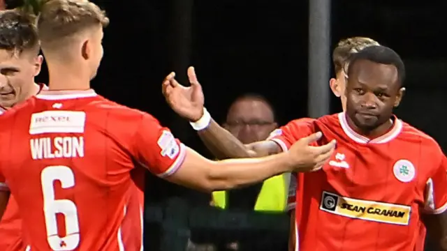 Eric McWoods celebrates scoring