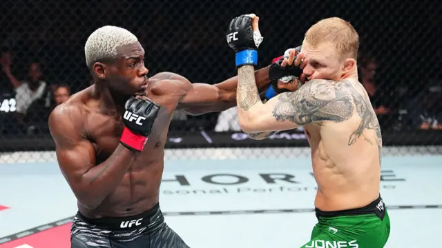 Bolaji Oki v Mason Jones