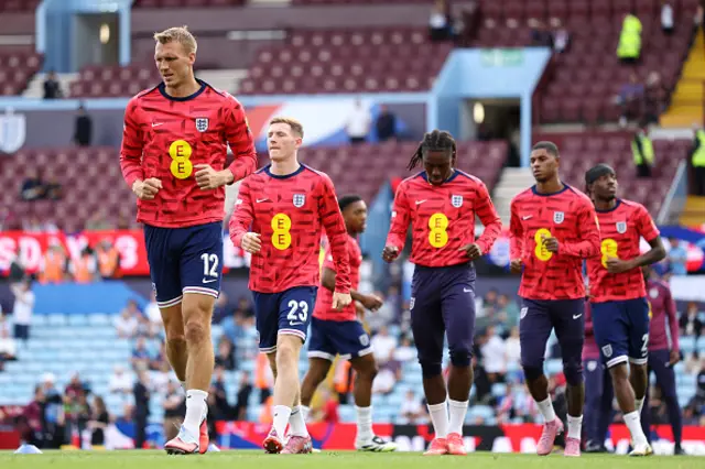 Dan Burn of England warms up