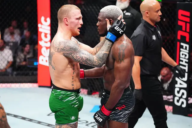 Mason Jones embraces Bolaji Oki