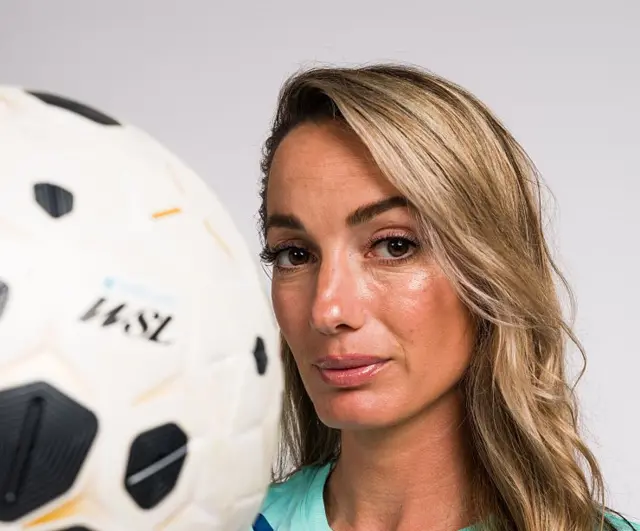 Kosovare Asllani poses with the WSL match ball
