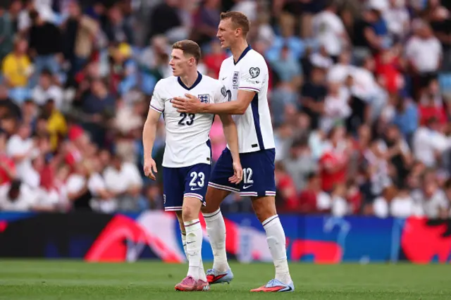 Dan Burn with Elliot Anderson of England
