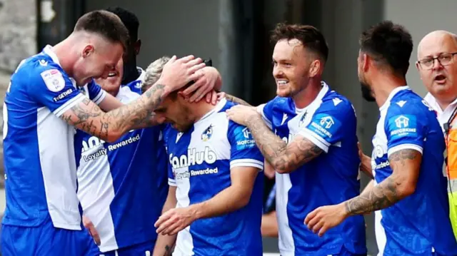 Luke Thomas celebrates his second goal