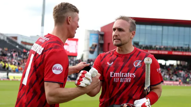 Keaton Jennings (left) congratulates Liam Livingstone as he leaves the field as Lancashire beat Kent