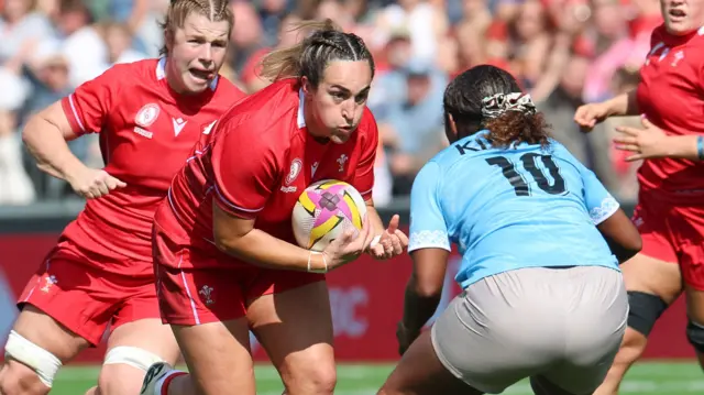 Wales player runs with ball