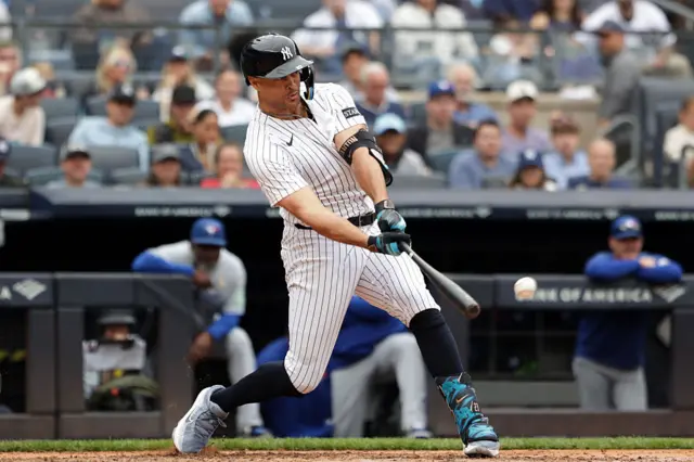 Giancarlo Stanton #27 of the New York Yankees bats