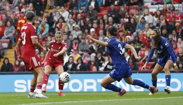 Liverpool's Cornelia Kapocs scores their first goal