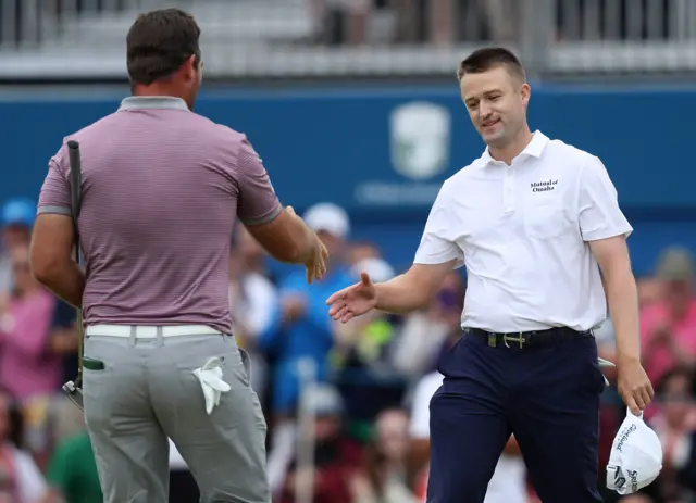 Ryan Fox congratulates Russell Knox on his win