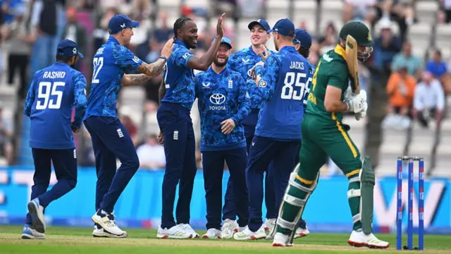 England celebrate the wicket of Aiden Markram