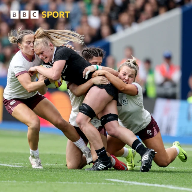 New Zealand Black Fern's Jorja Miller is tackled by Ireland's Aoibheann Reilly, Amee-Leigh Costigan and Aoife Dalton